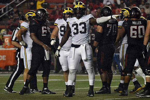 Ryan Glasgow (96) and Taco Charlton (33)