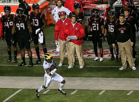 Jabrill Peppers (5) and Rutgers Head Coach Chris Ash