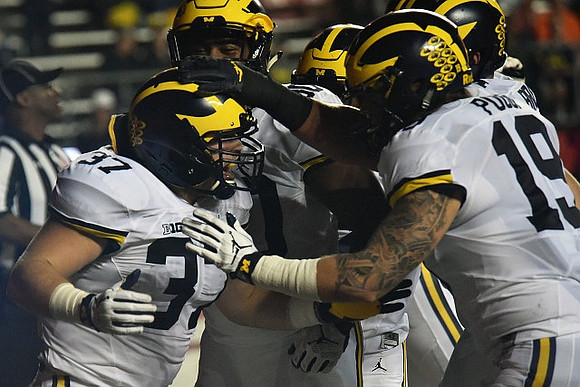 Bobby Henderson (37) and Henry Poggi (19)