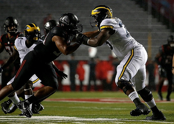De'Veon Smith (4) and Juwann Bushell-Beatty (76)