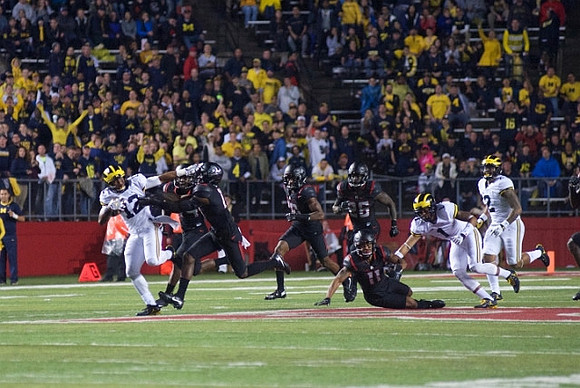 Chris Evans (12), Kekoa Crawford (1), and Devin Asiasi (2)