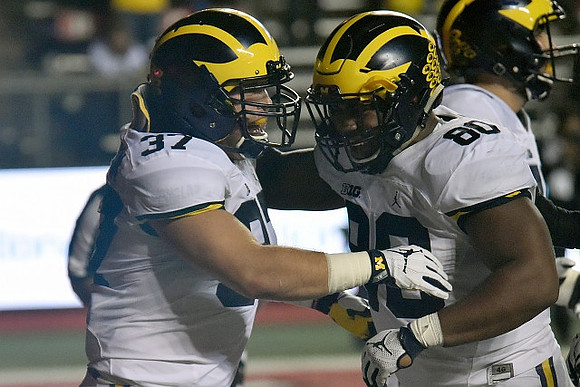 Bobby Henderson (37) and Khalid Hill (80)