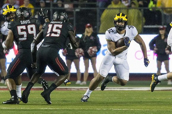 Khalid Hill (80) and Ty Isaac (32)