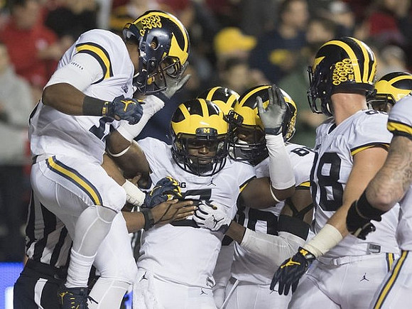 Jabrill Peppers (5) and Khalid Hill (80)