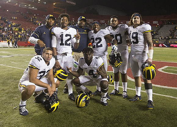 Ty Isaac (32), Chris Evans (12), De'Veon Smith (4), Karan Higdon (22), Khalid Hill (80), and Henry Poggi (19)