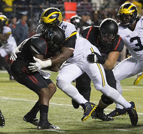Maurice Hurst (73) and Rashan Gary (3)