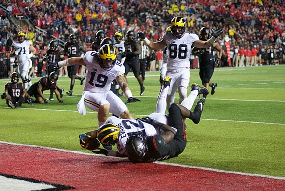 Ben Braden (71), Henry Poggi (19), Chris Evans (12), and Jake Butt (88)