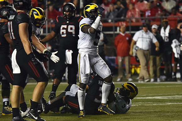 Jabrill Peppers (5) and Mike McCray (9)