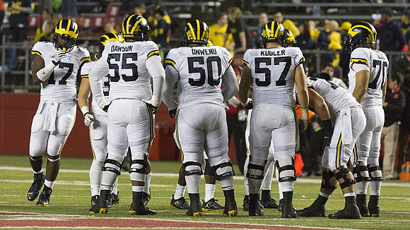 Tyrone Wheatley Jr. (17), David Dawson (55), Michael Onwenu (50), Patrick Kugler (57), and Nolan Ulizio (70)