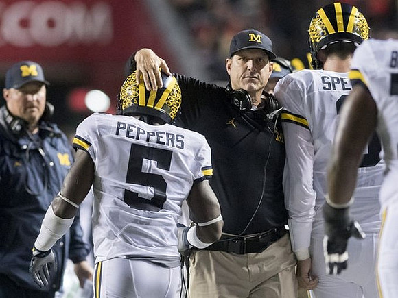 Tim Drevno, Jabrill Peppers (5), Jim Harbaugh, and Wilton Speight (3)