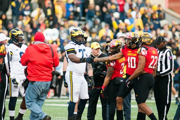 Mike McCray (9) and Maurice Hurst (73)