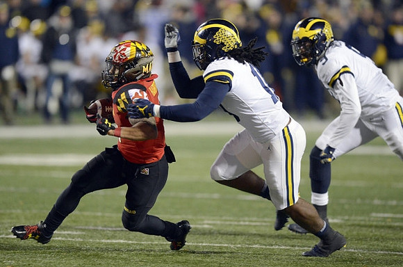 Devin Bush (10) and Mike McCray (9)