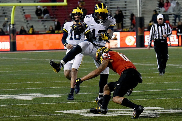 Chris Evans (12) and Brandon Peters (18)