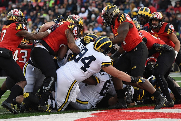 Stephen Spanellis (94), Chris Evans (12), and Khalid Hill (80)