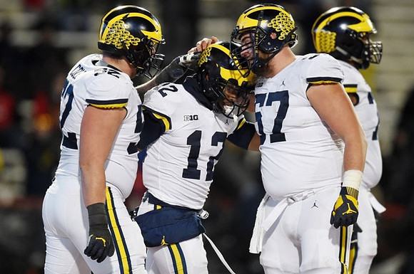 Mason Cole (52), Chris Evans (12), and Patrick Kugler (57)