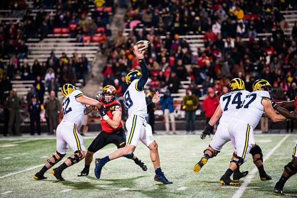 Mason Cole (52), Brandon Peters (18), Ben Bredeson (74), and Patrick Kugler (57)