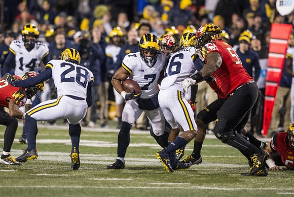 Josh Metellus (14), Brandon Watson (28), Khaleke Hudson (7), and Jaylen Kelly-Powell (16)