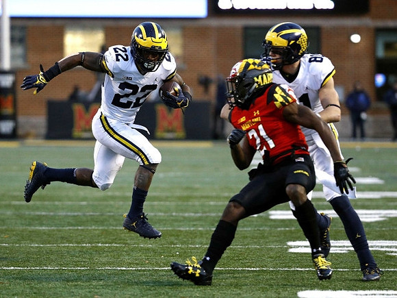 Karan Higdon (22) and Nate Schoenle (81)
