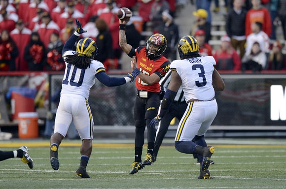 Devin Bush (10) and Rashan Gary (3)
