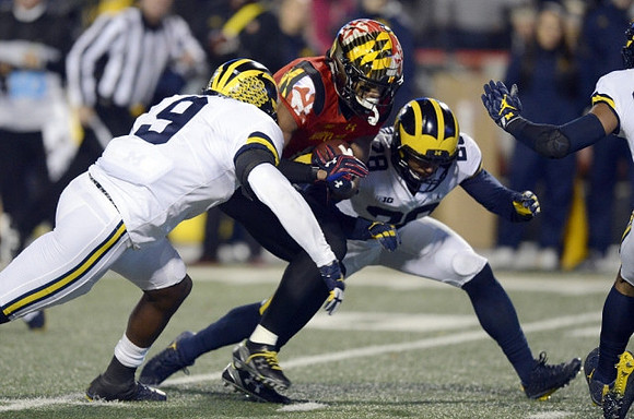 Mike McCray (9) and Brandon Watson (28)