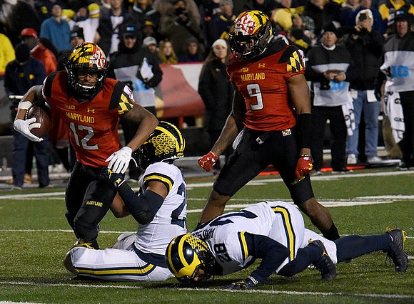 Tyree Kinnel (23) and Brandon Watson (28)