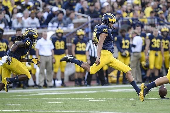 Devin Bush (10) and Kenny Allen (91)