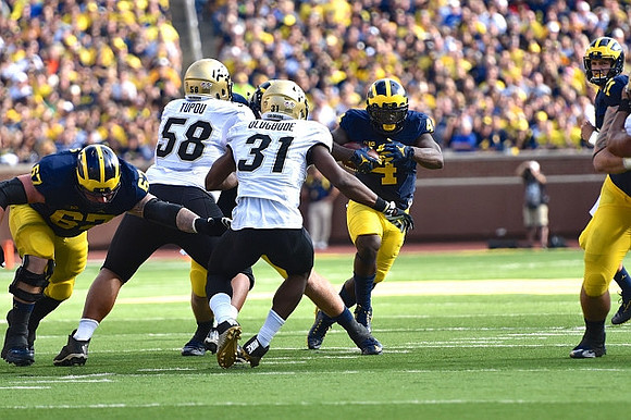 Kyle Kalis (67), De'Veon Smith (4), and Wilton Speight (3)