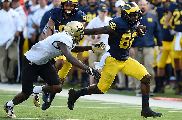 Grant Perry (9) and Amara Darboh (82)