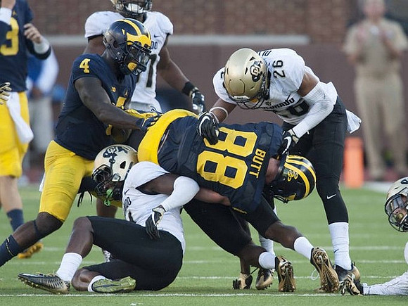 De'Veon Smith (4) and Jake Butt (88)