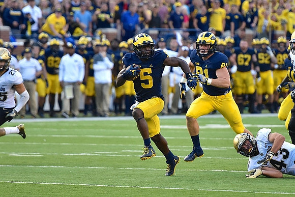 Jabrill Peppers (5) and Michael Jocz (81)