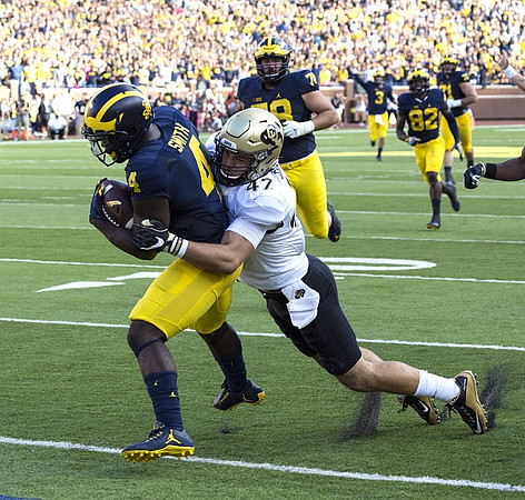 De'Veon Smith (4), Erik Magnuson (78), Amara Darboh (82), Wilton Speight (3), and Ben Braden (71)