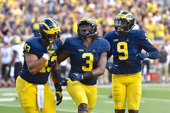 Chris Wormley (43), Rashan Gary (3), and Mike McCray (9)