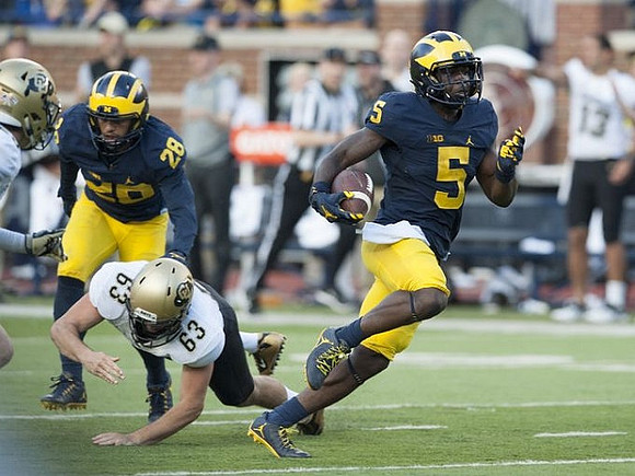 Brandon Watson (28) and Jabrill Peppers (5)