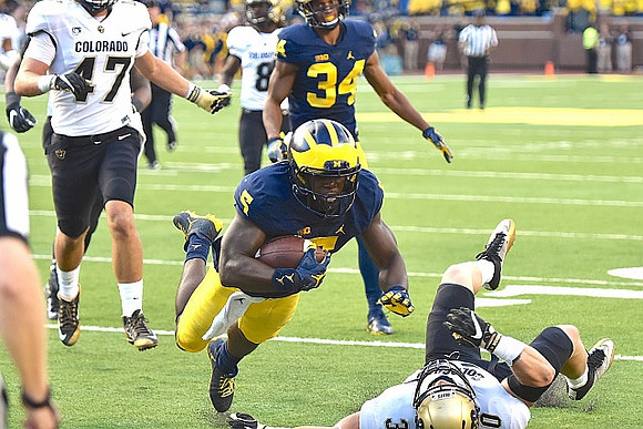 Jabrill Peppers (5) and Jeremy Clark (34)