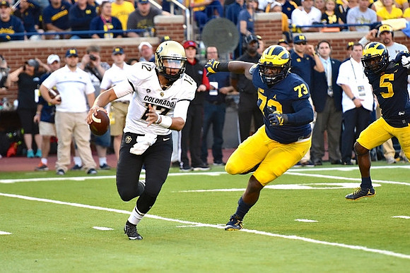 Maurice Hurst (73) and Jabrill Peppers (5)