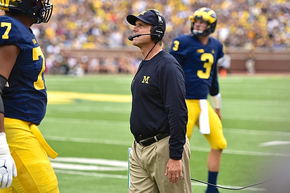 Grant Newsome (77), Jim Harbaugh, and Wilton Speight (3)
