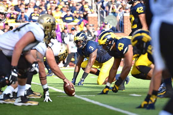 Rashan Gary (3), Chris Wormley (43), Ben Gedeon (42), and Chase Winovich (15)