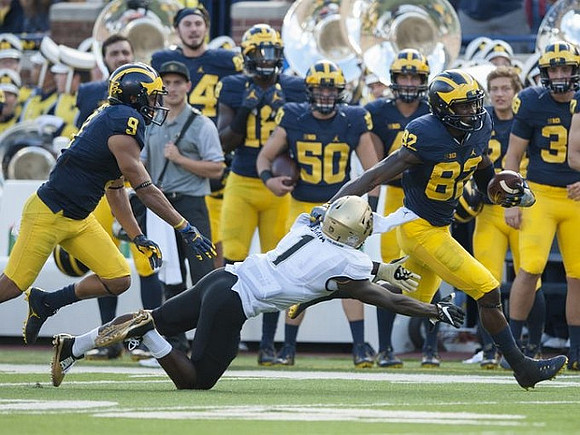 Grant Perry (9) and Amara Darboh (82)