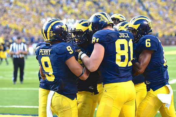 Grant Perry (9), Jabrill Peppers (5), Michael Jocz (81), and Keith Washington (6)