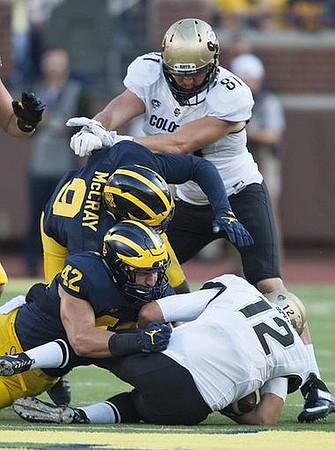 Ben Gedeon (42) and Mike McCray (9)