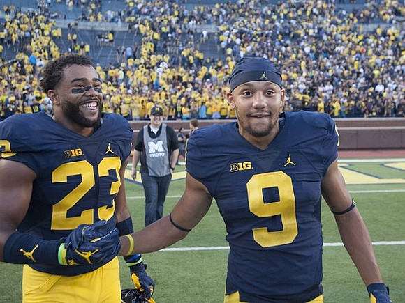 Tyree Kinnel (23) and Grant Perry (9)