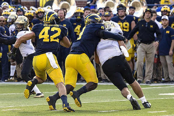 Ben Gedeon (42) and Mike McCray (9)