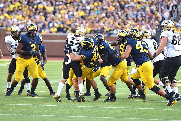 Rashan Gary (3), Ben Gedeon (42), Ryan Glasgow (96), Jabrill Peppers (5), and Chris Wormley (43)