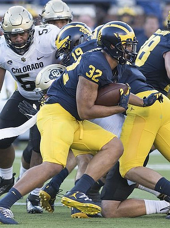 Henry Poggi (19), Ty Isaac (32), and Erik Magnuson (78)