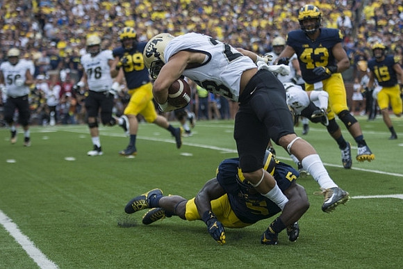 Ian Bunting (89), Jabrill Peppers (5), Chris Wormley (43), and Chase Winovich (15)