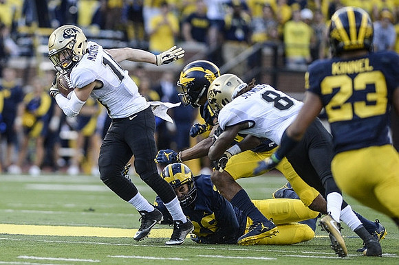 Brandon Watson (28) and Tyree Kinnel (23)