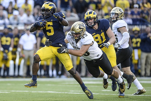 Jabrill Peppers (5) and Michael Jocz (81)