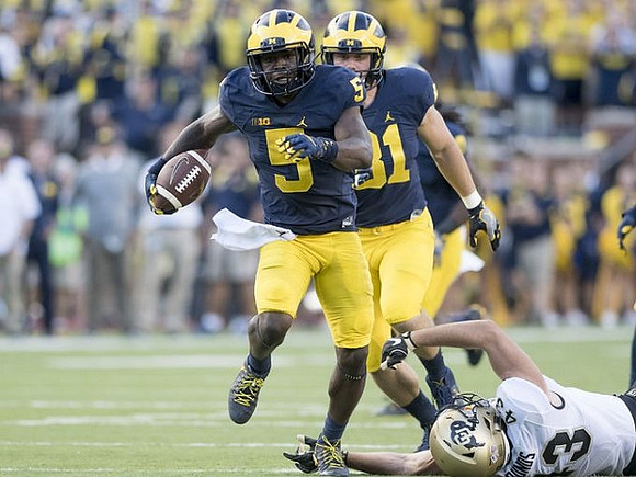 Michael Jocz (81) and Jabrill Peppers (5)