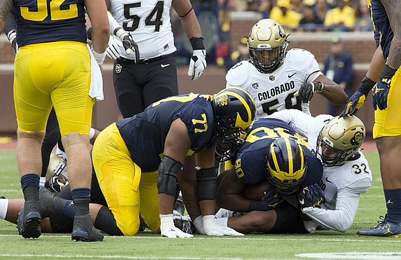 Grant Newsome (77) and Khalid Hill (80)
