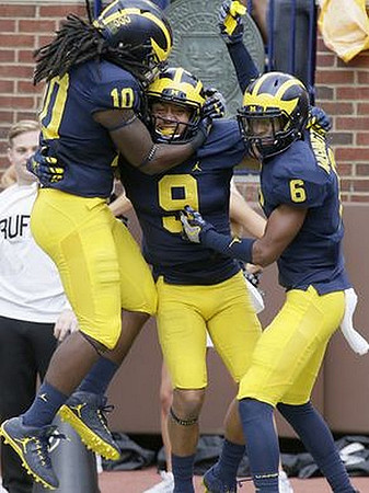 Devin Bush (10), Grant Perry (9), and Keith Washington (6)